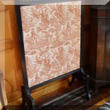 F26. Screen with toile upholstery.